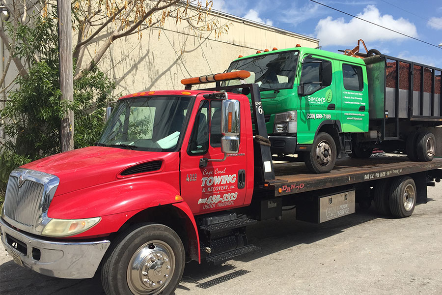 You are currently viewing Tips for Safely Loading And Unloading A Flatbed Tow Truck