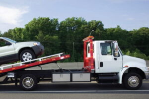 A tow truck towing a car